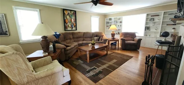 a living room with furniture and a window