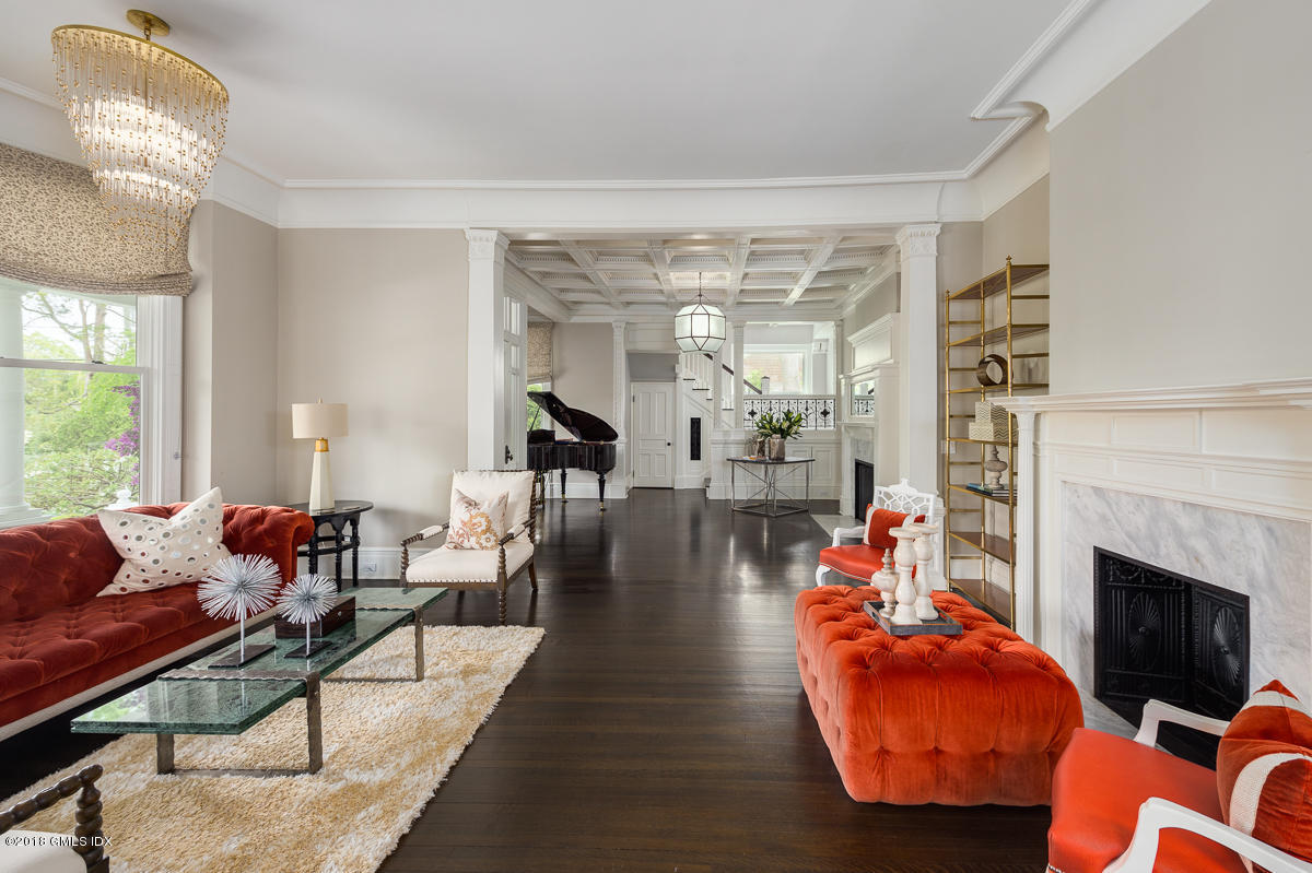 30 Club Road Riverside, CT 06878 - Photo 11 of 53 a living room with furniture and a fireplace