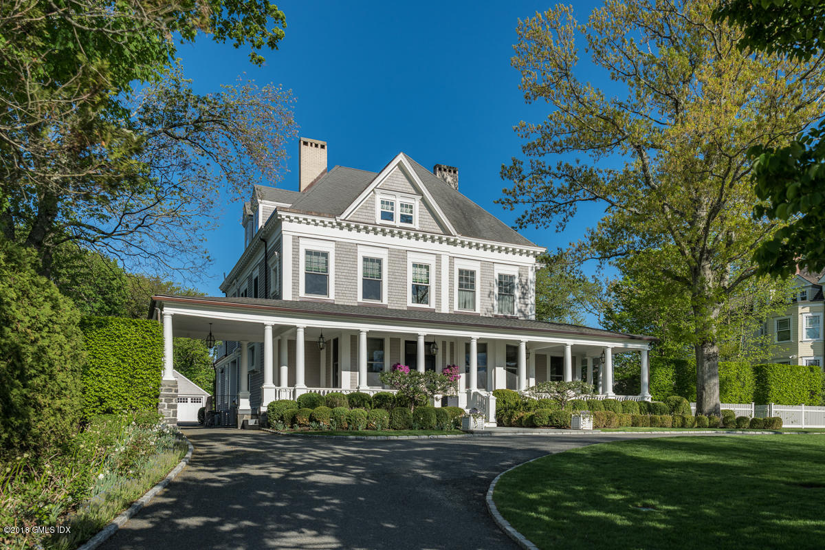 30 Club Road Riverside, CT 06878 - Photo 2 of 53 a front view of a house with a garden