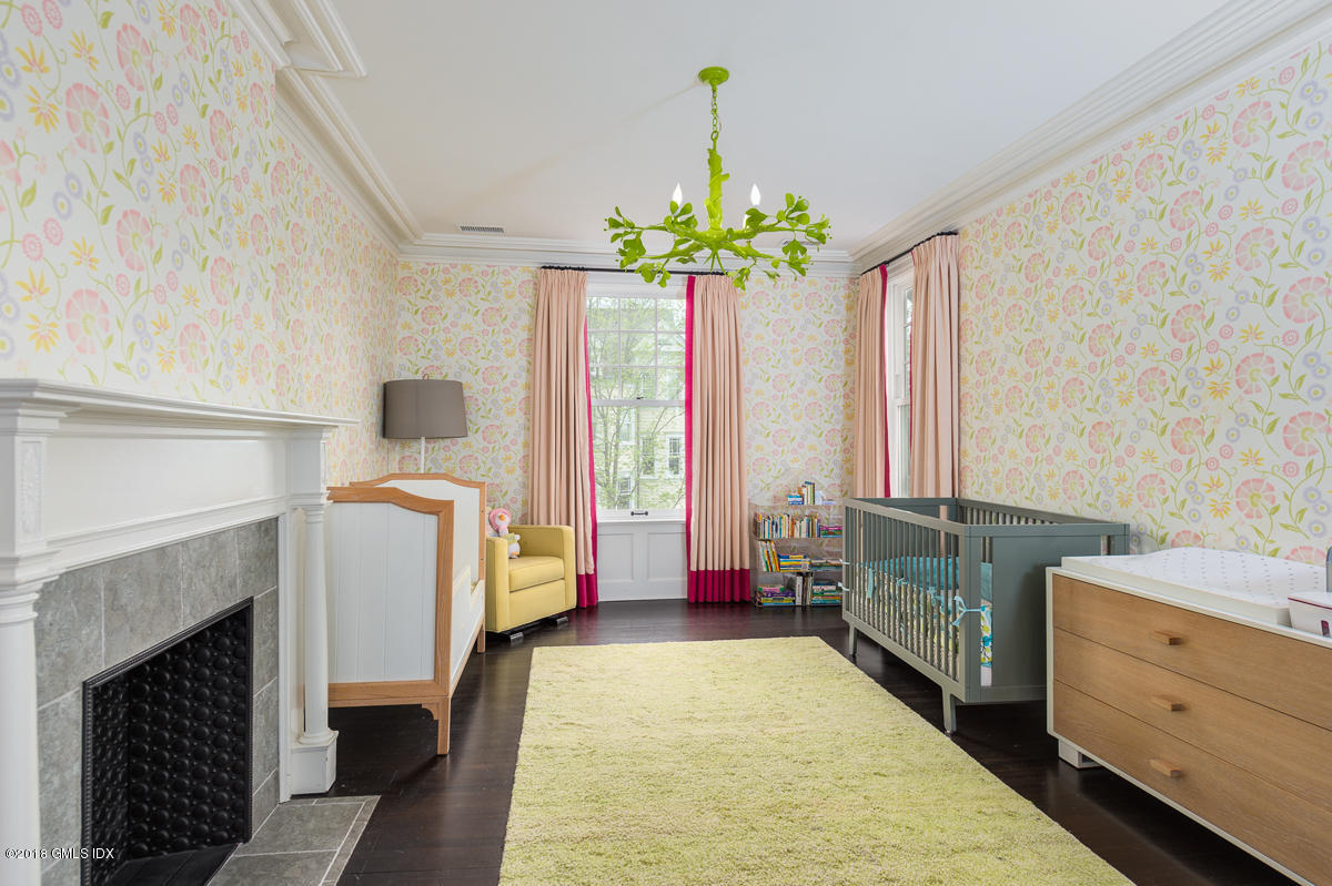 30 Club Road Riverside, CT 06878 - Photo 40 of 53 a living room with furniture and a fireplace