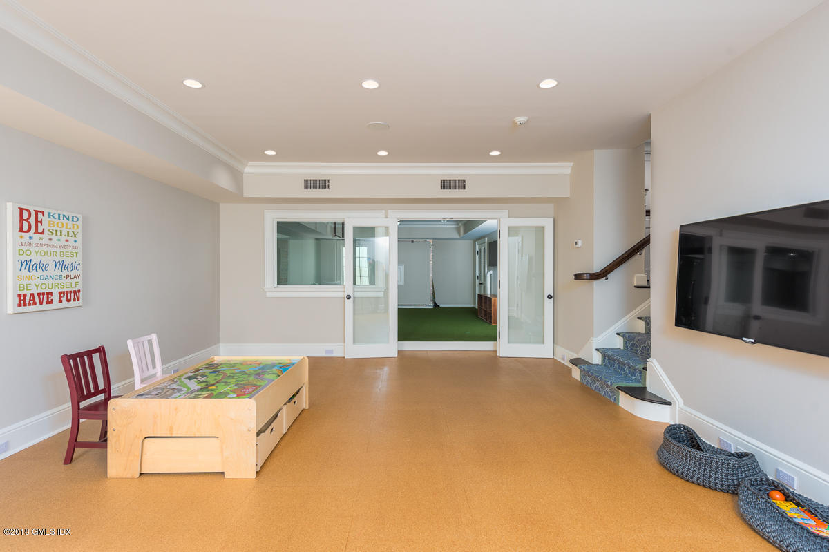 30 Club Road Riverside, CT 06878 - Photo 44 of 53 a living room with furniture and a wooden floor