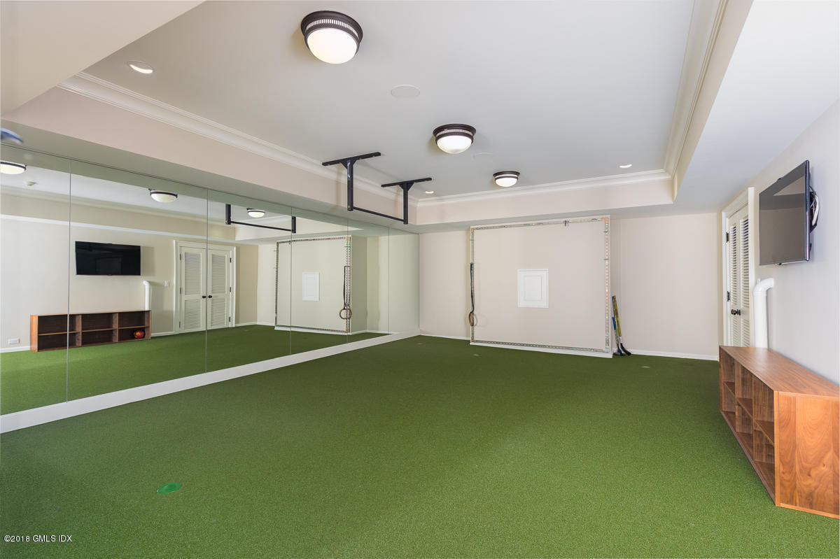 30 Club Road Riverside, CT 06878 - Photo 45 of 53 a view of a livingroom with a fireplace and window
