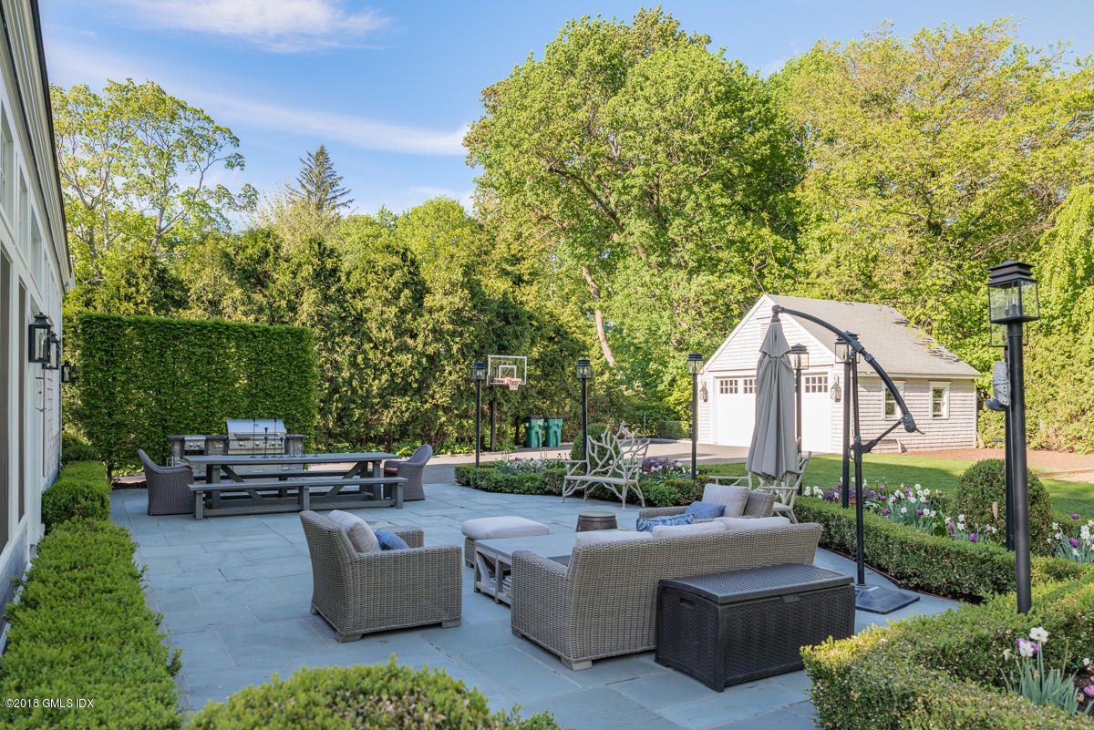 30 Club Road Riverside, CT 06878 - Photo 48 of 53 a view of a patio with couches and a fire pit