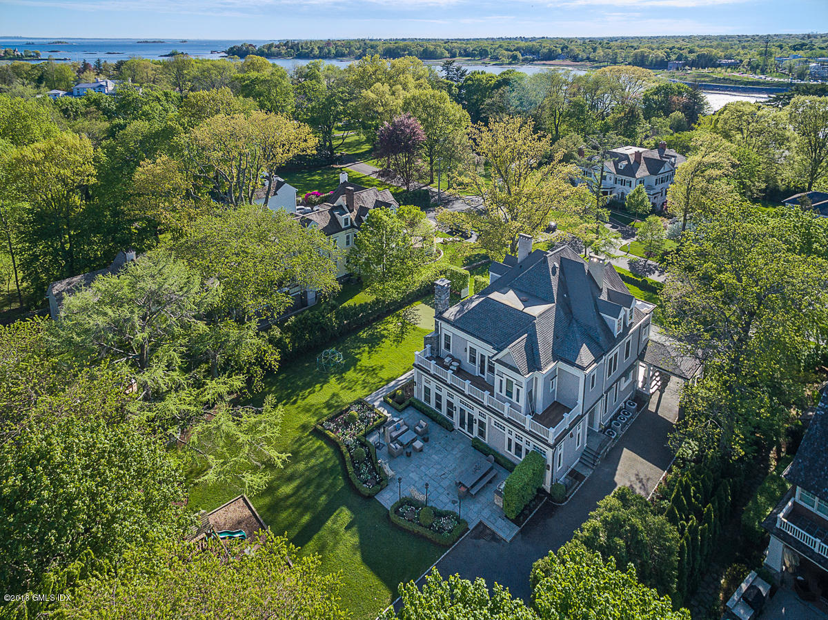 30 Club Road Riverside, CT 06878 - Photo 6 of 53 a view of a house with a yard and sitting area