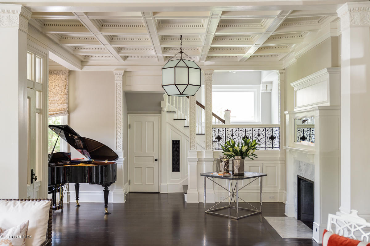 30 Club Road Riverside, CT 06878 - Photo 9 of 53 a living room with fireplace furniture and a potted plant
