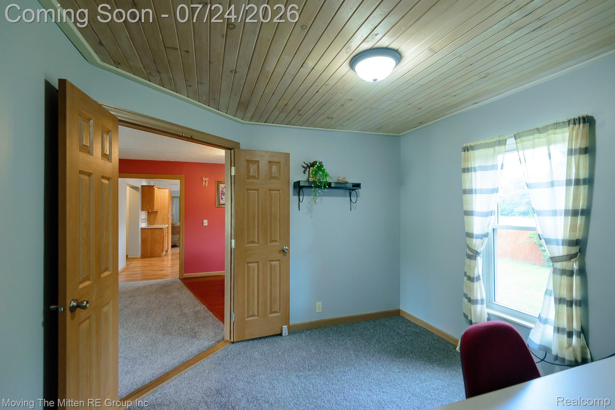 37460 Tyler Road Romulus, MI 48174 - Photo 21 of 52 Wood-paneled ceiling with an overhead flush-mount light fixture