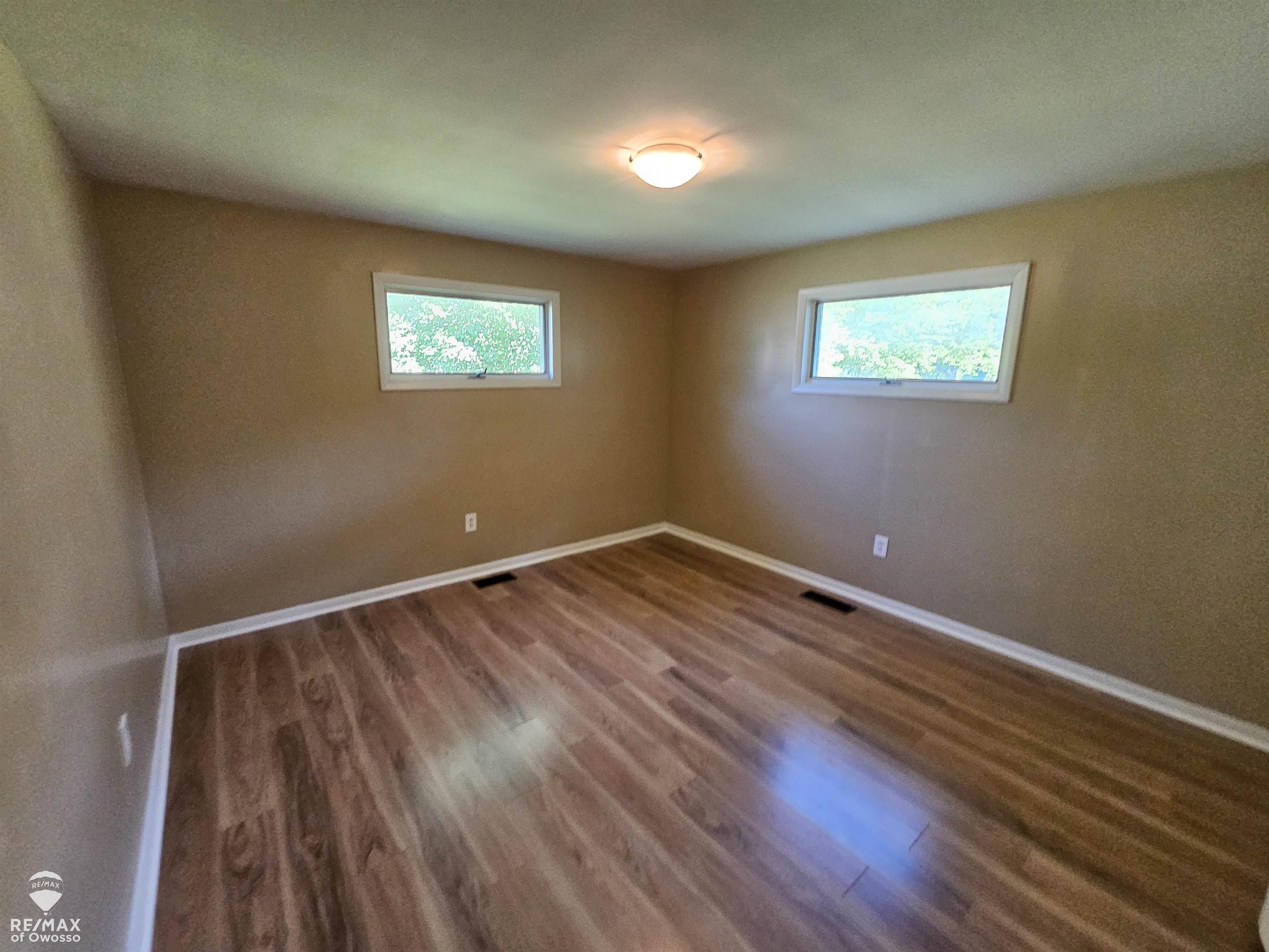 1516 North Hickory Road Owosso, MI 48867 - Photo 22 of 26 Bedroom 3 towards the front.