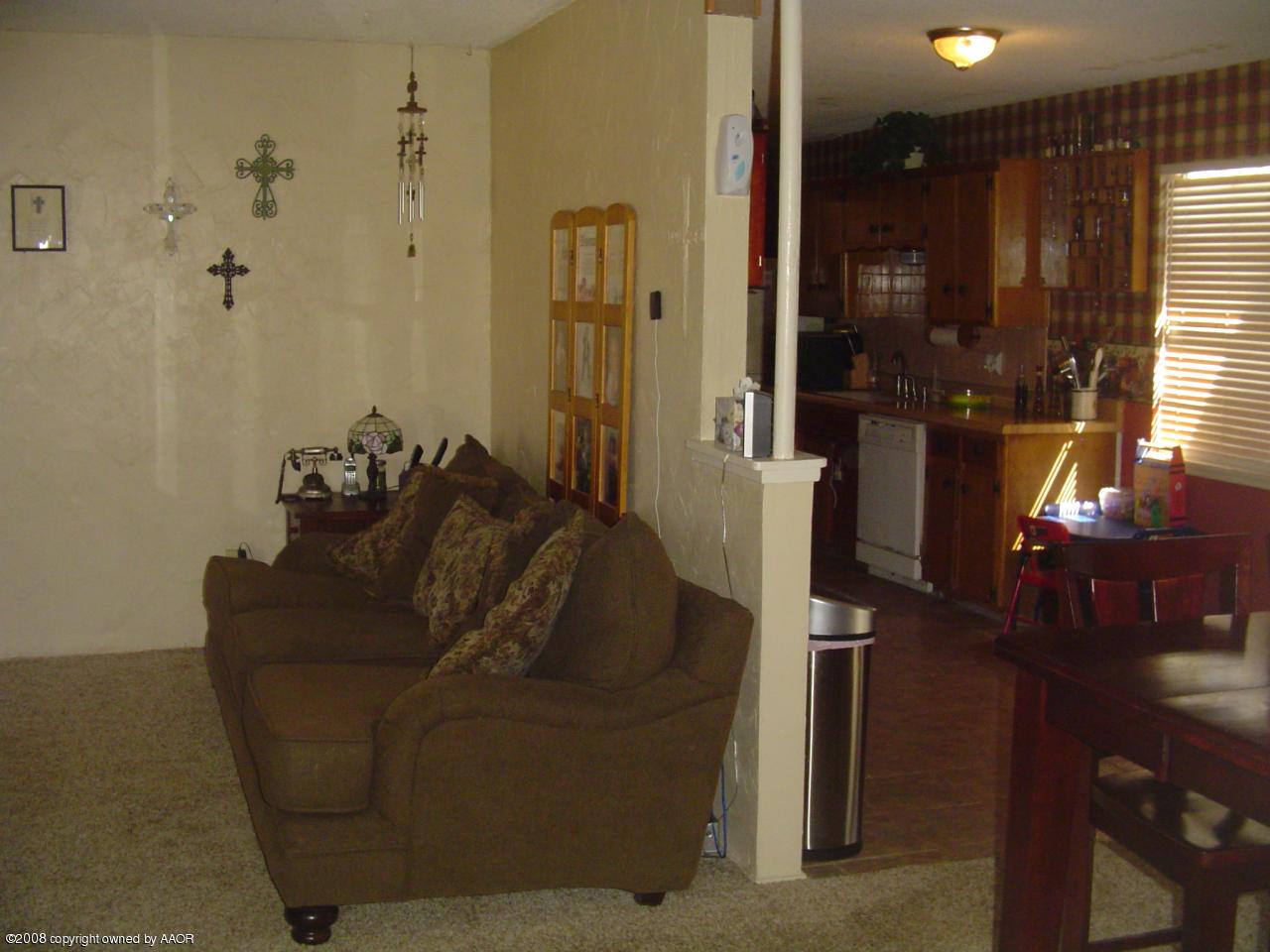 5311 Parker Street Amarillo, TX 79110 - Photo 5 of 10 View into kitchen and living room