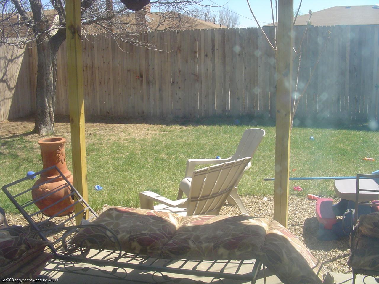 5311 Parker Street Amarillo, TX 79110 - Photo 9 of 10 backyard/8 ft fence