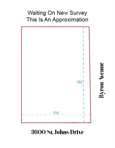 a view of a living room filled with furniture and a window