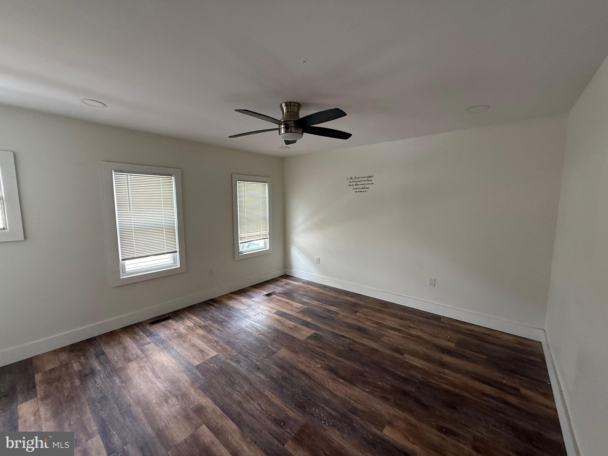 132 Walnut Street Westville, NJ 08093 - Photo 11 of 23 a view of room with window and ceiling fan