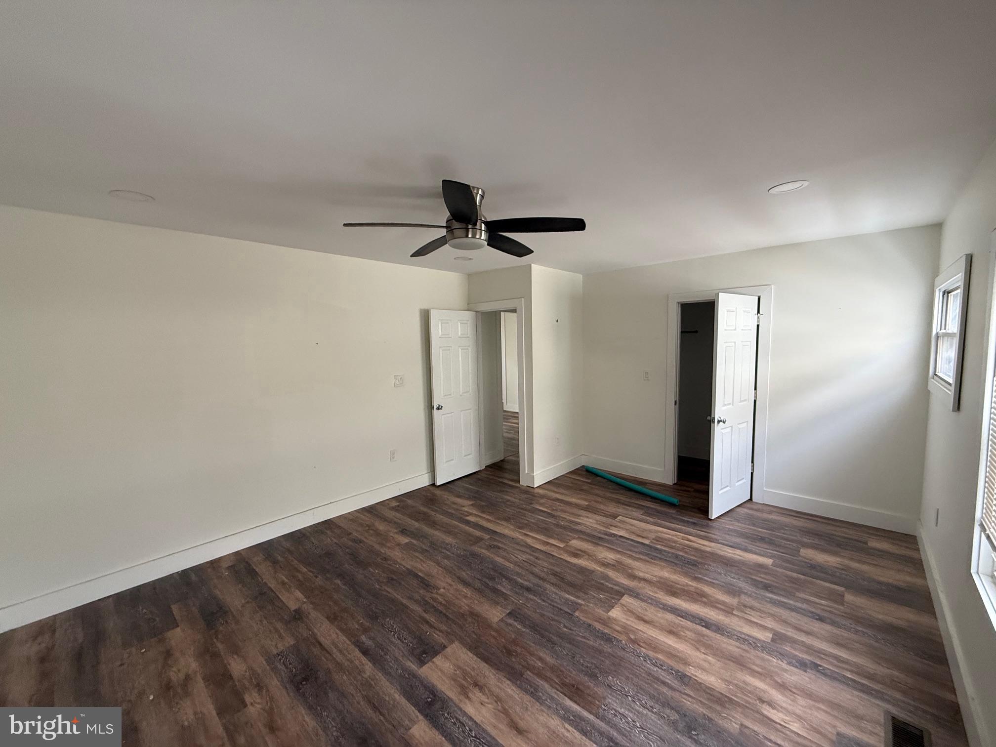 132 Walnut Street Westville, NJ 08093 - Photo 12 of 23 a view of empty room with wooden floor