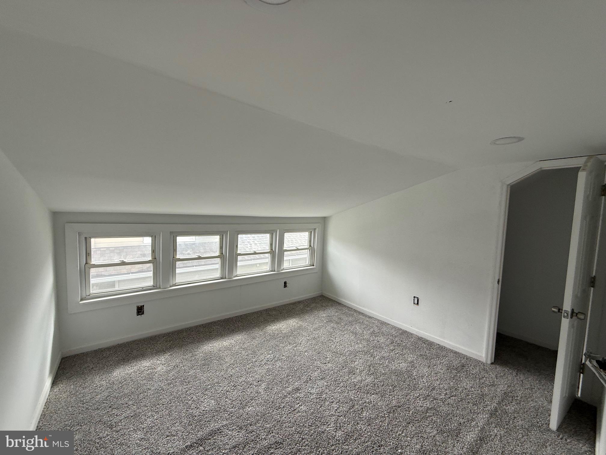 132 Walnut Street Westville, NJ 08093 - Photo 14 of 23 an empty room with windows