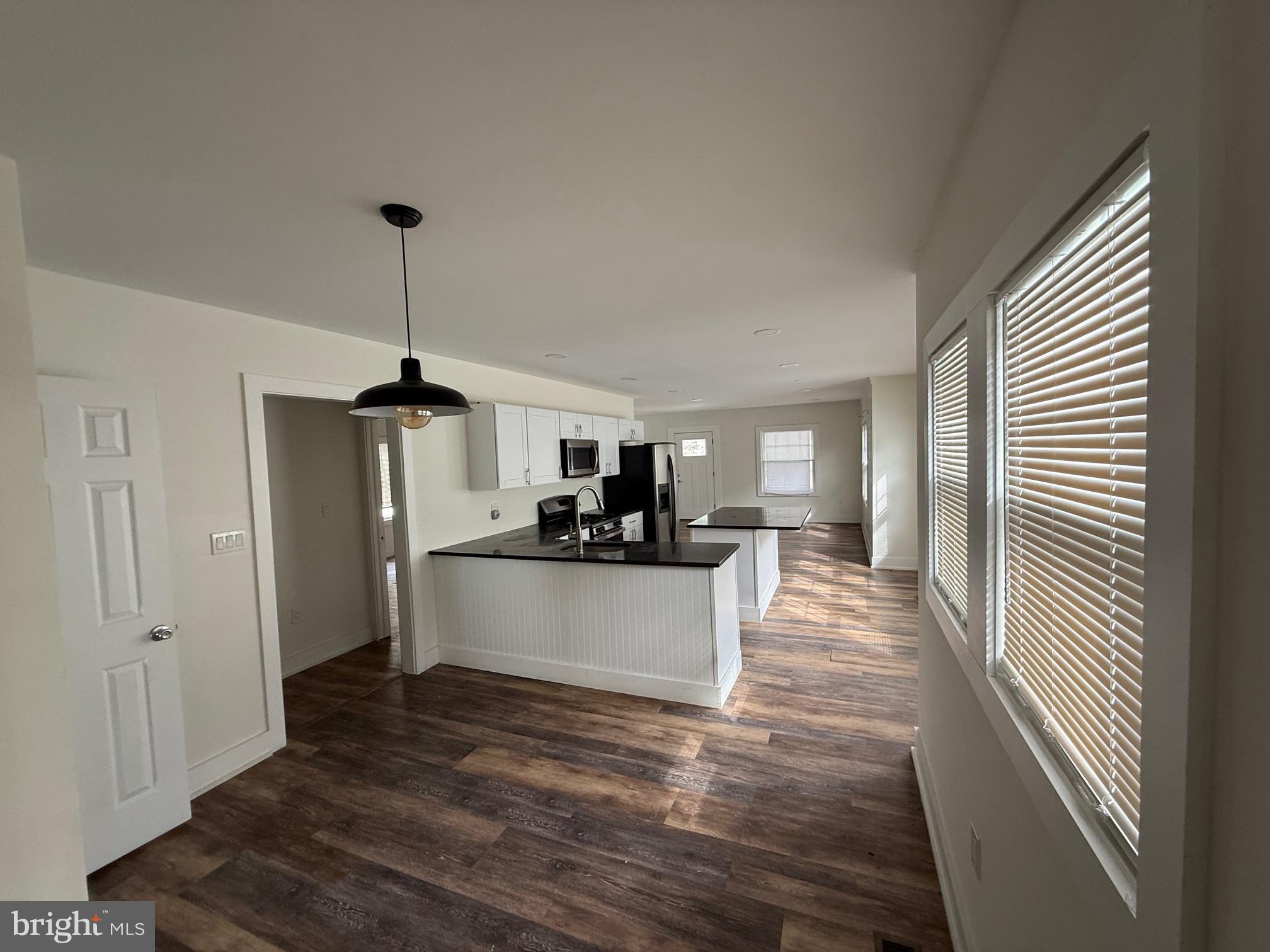 132 Walnut Street Westville, NJ 08093 - Photo 10 of 23 a view of a living room with furniture and a window