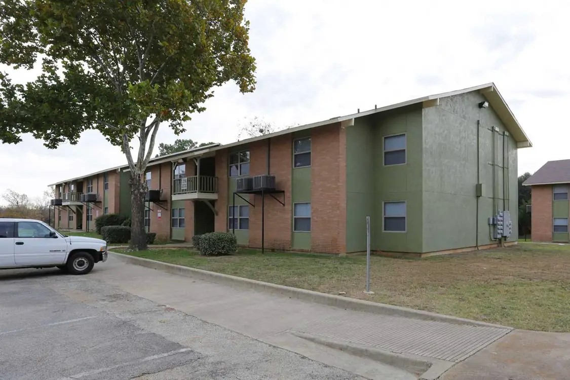 7203 South Great Trinity Forest Way Dallas, TX 75217 - Photo 6 of 9 a view of a car park in front of house