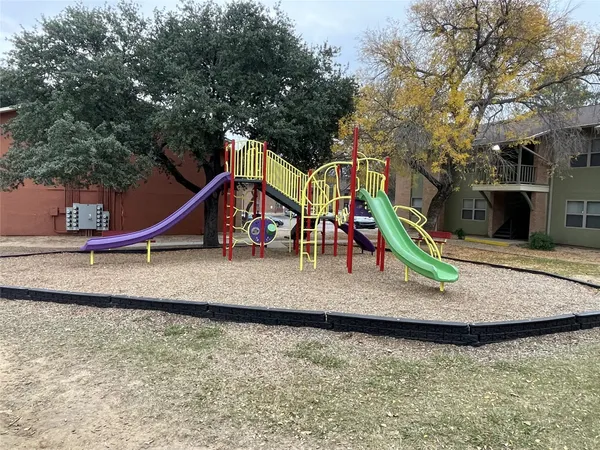 a view of a park with slide