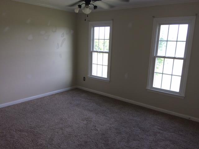 2498 Pleasant View Road Pleasant View, TN 37146 - Photo 11 of 14 an empty room with a window