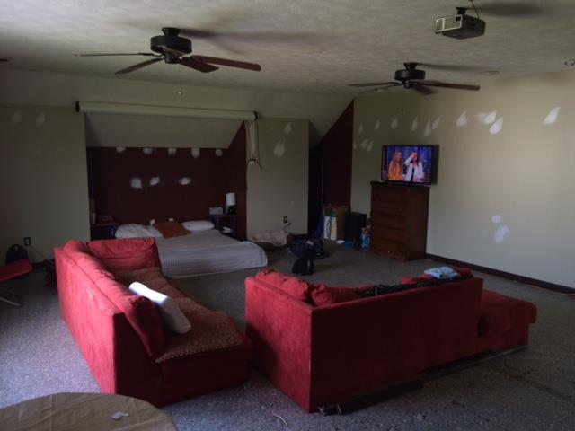 2498 Pleasant View Road Pleasant View, TN 37146 - Photo 14 of 14 a living room with furniture and a flat screen tv
