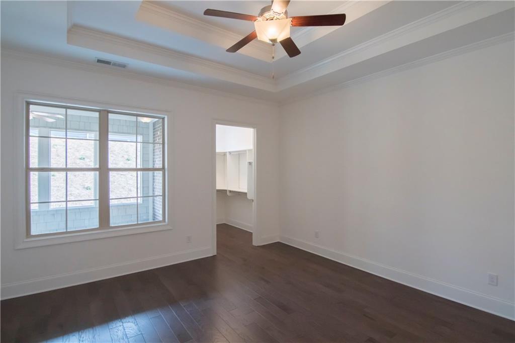 5865 Overlook Ridge East, Unit 105 Suwanee, GA 30024 - Photo 13 of 40 Flagstone porch and mahogany front door at entry