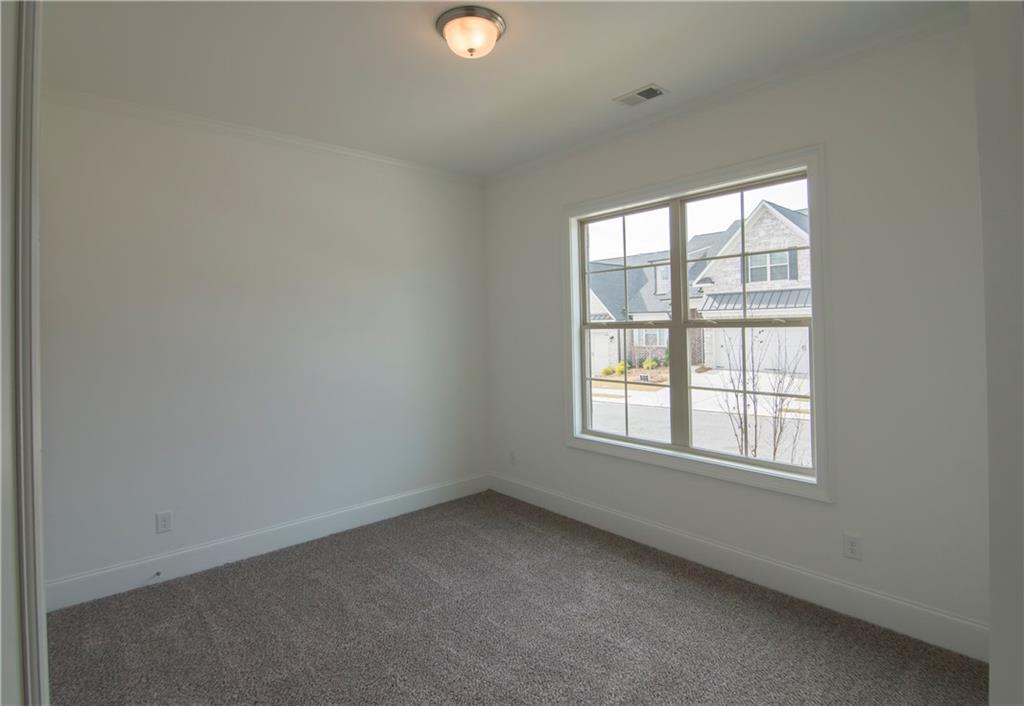 5865 Overlook Ridge East, Unit 105 Suwanee, GA 30024 - Photo 20 of 40 Custom closet in separate "Her" closet