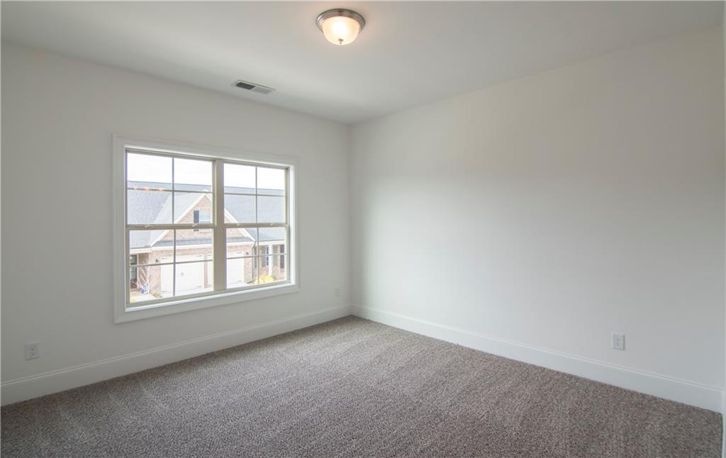 5865 Overlook Ridge East, Unit 105 Suwanee, GA 30024 - Photo 22 of 40 Third bedroom upstairs
