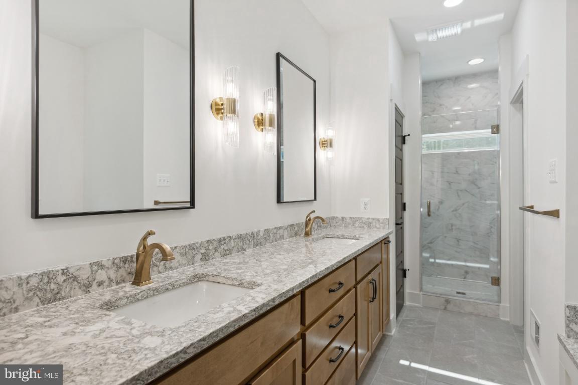 3110 Thurston Road Frederick, MD 21704 - Photo 20 of 38 Luxury primary bathroom with dual vanities.