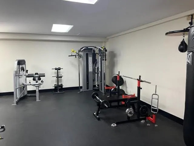 a view of a room with gym equipment