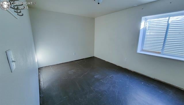 950 Quail Road Coal Creek, CO 81221 - Photo 35 of 36 Spare room with a wealth of natural light