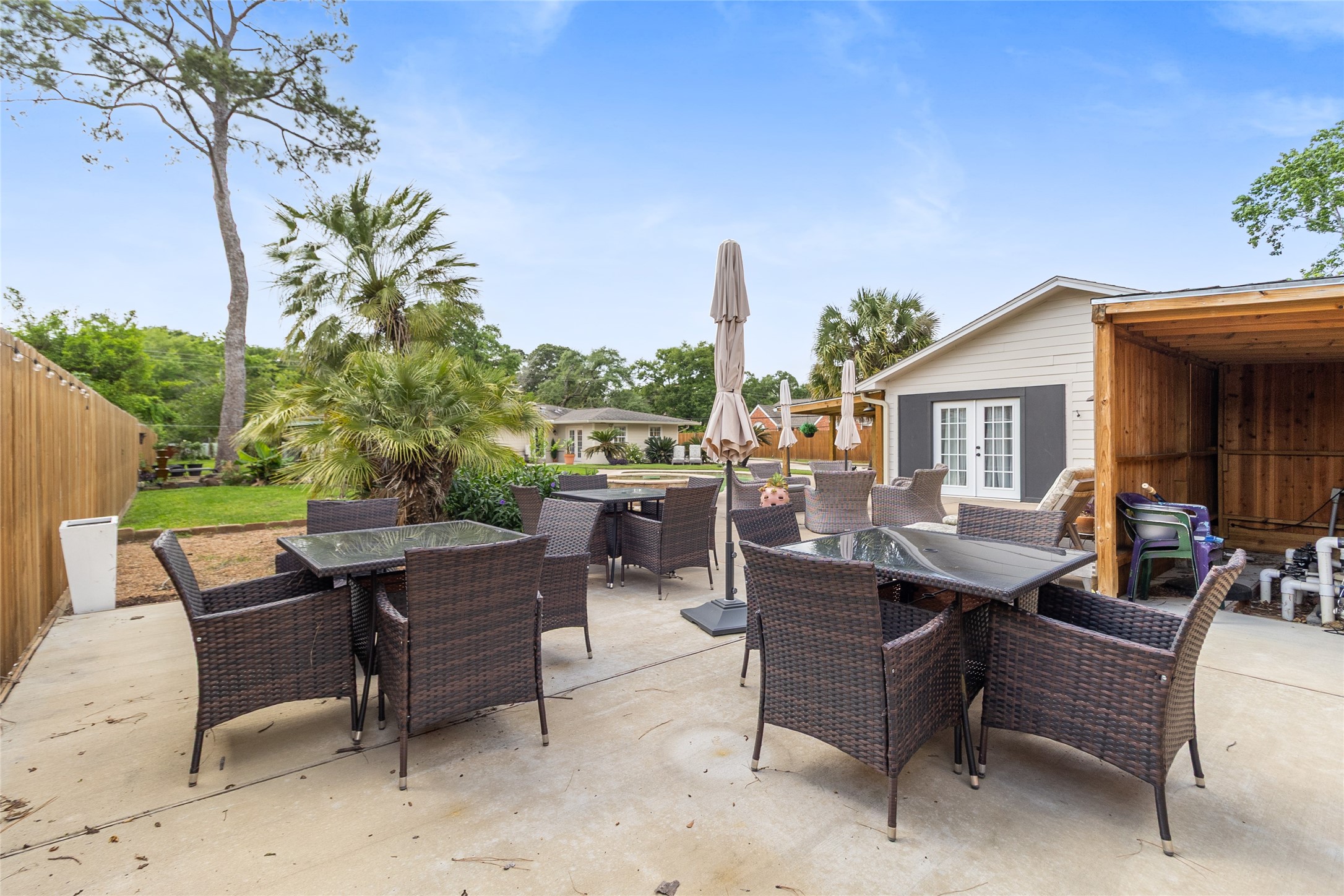 1914 Peppermill Road Houston, TX 77080 - Photo 16 of 49 Out here, you’ve got the perfect setup for hosting—multiple seating areas that make it easy to entertain, dine, and keep everyone together.