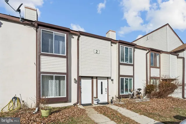 a view of a house with a porch