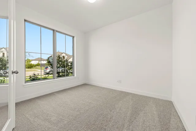 a view of entryway with wooden floor and stairs