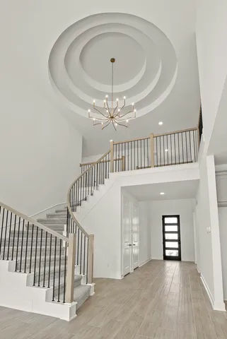 a view of a hallway view with staircase