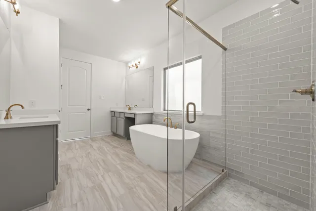 a bathroom with a shower and a bathtub