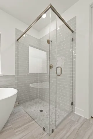 a bathroom with a sink toilet and a mirror