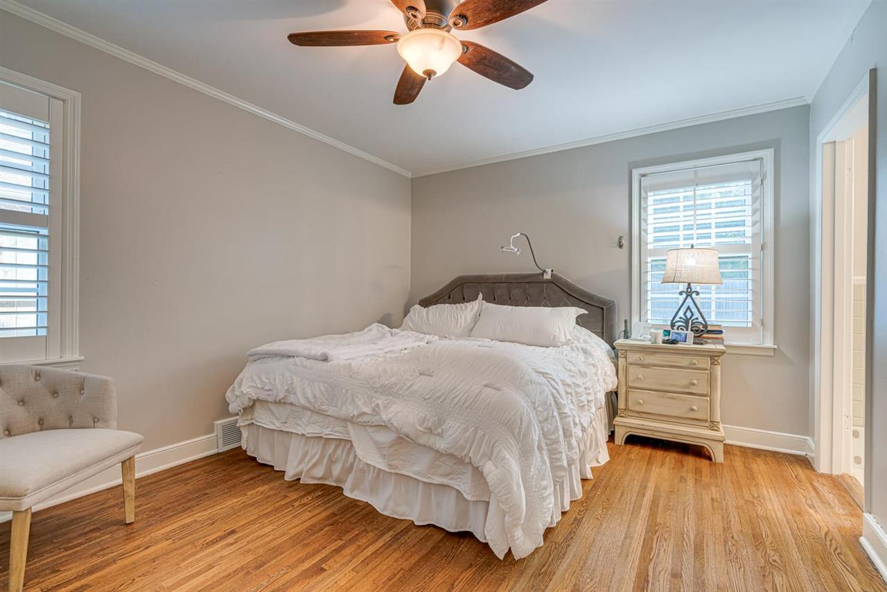 80 East Carlos Road Memphis, TN 38117 - Photo 15 of 25 a bedroom with a bed and a ceiling fan