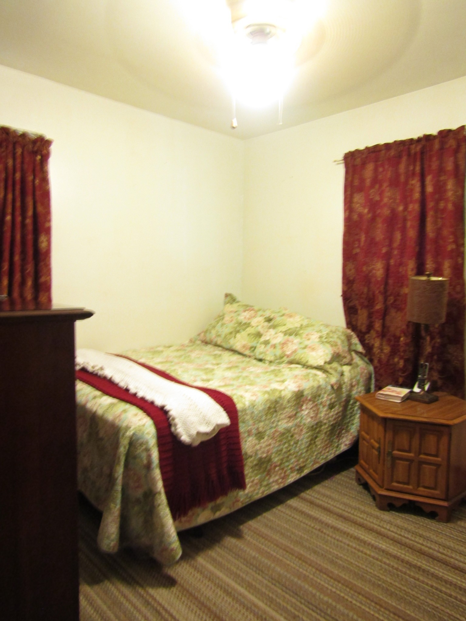 171 Sheep Ranch Road Altamont, TN 37301 - Photo 11 of 48 a bedroom with a bed and wooden floor