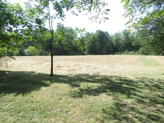 a view of a road with an outdoor space