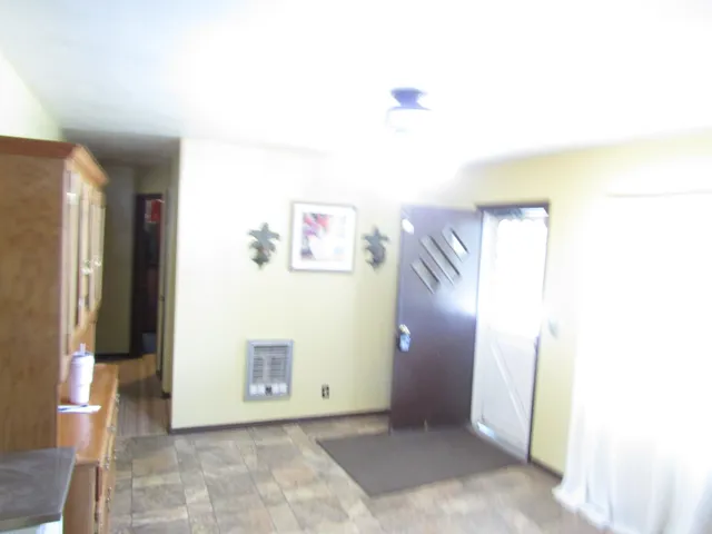 a view of a hallway with closet