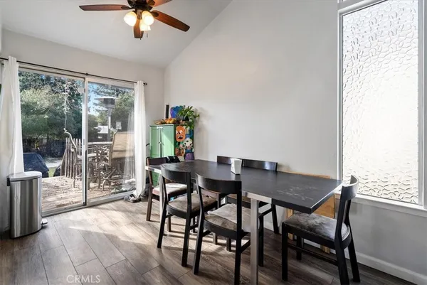 a bathroom with a double vanity sink toilet and a mirror