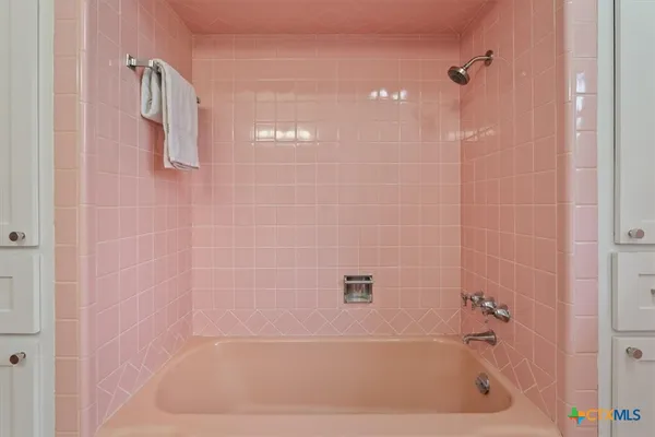 a bathroom with a bathtub