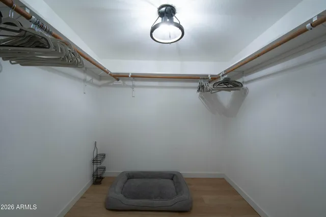 a view of a balcony dining table and chairs
