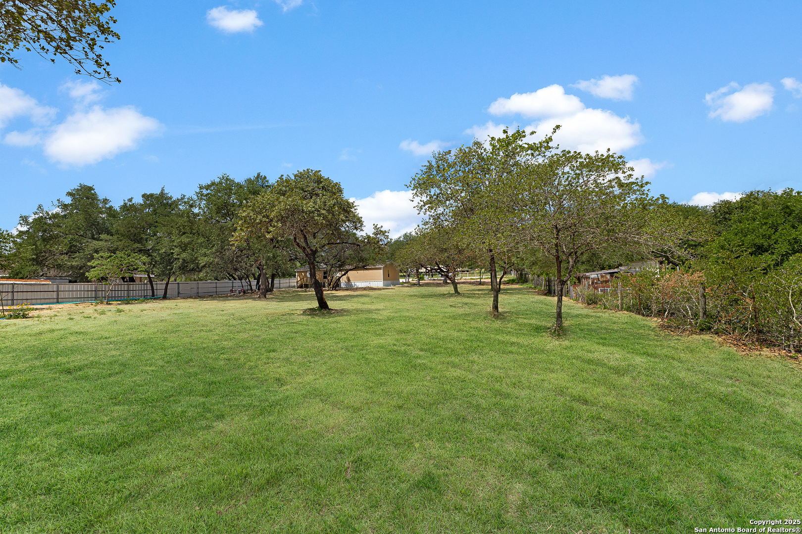 823 County Road 6850 Lytle, TX 78052 - Photo 24 of 33 a view of a green field