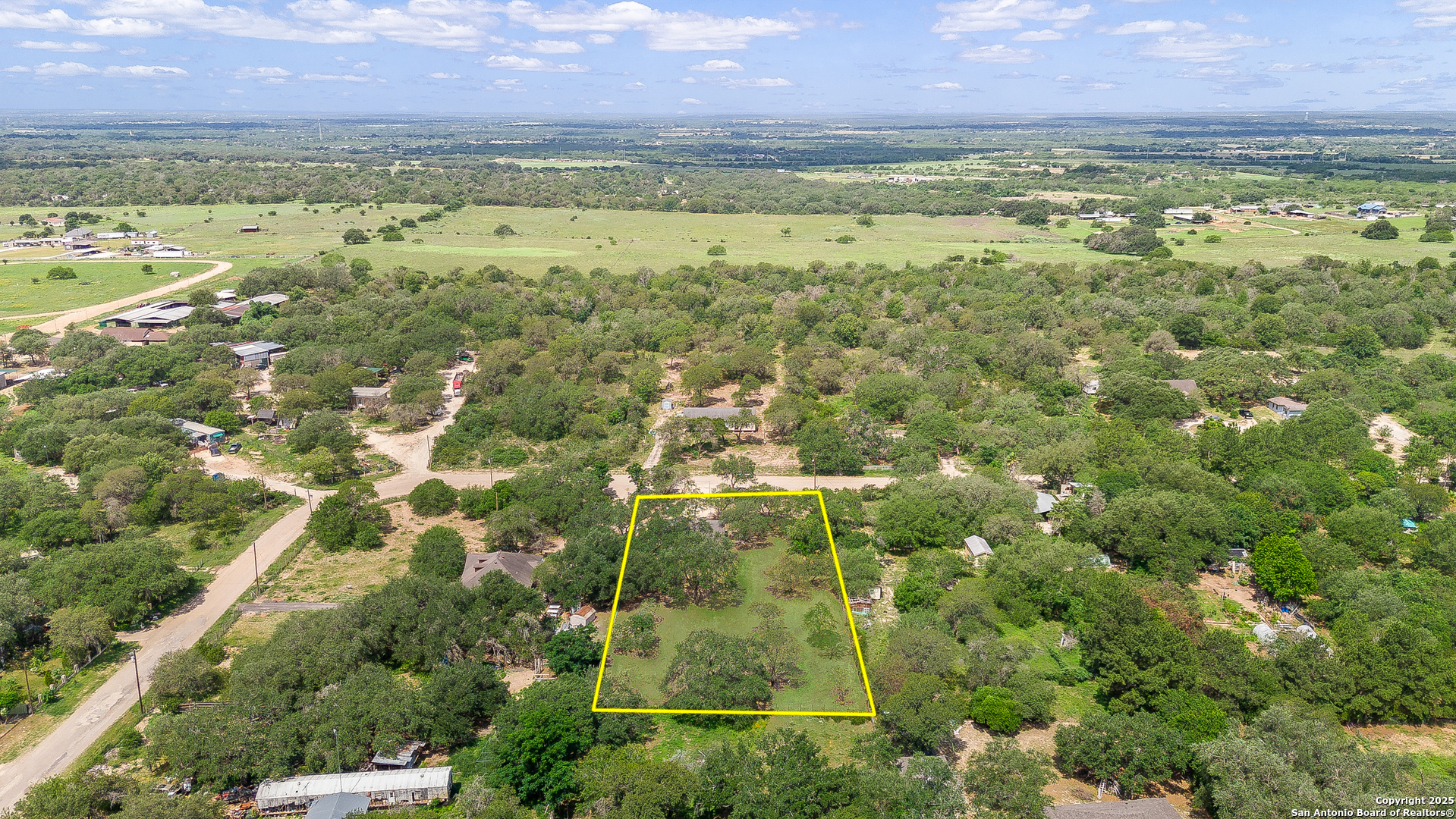 823 County Road 6850 Lytle, TX 78052 - Photo 30 of 33 a view of an ocean and a houses