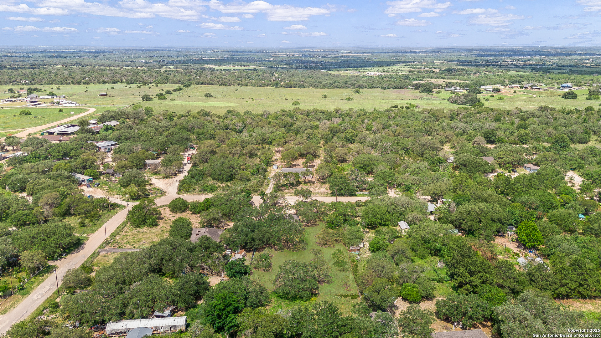 823 County Road 6850 Lytle, TX 78052 - Photo 31 of 33 a view of a city with an ocean