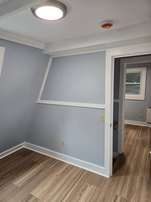121 Amherst Road Pelham, MA 01002 - Photo 13 of 31 a view of a room with wooden floor and window