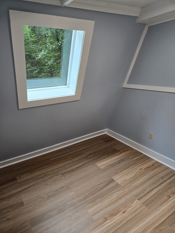 121 Amherst Road Pelham, MA 01002 - Photo 14 of 31 a view of a room with wooden floor and window