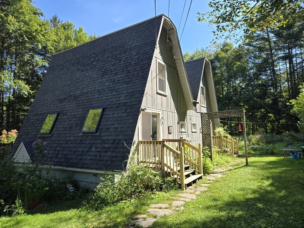 121 Amherst Road Pelham, MA 01002 - Photo 2 of 31 a view of outdoor space with garden and entertaining space