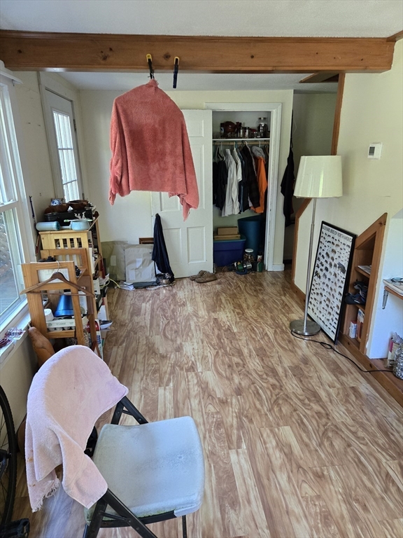 121 Amherst Road Pelham, MA 01002 - Photo 24 of 31 a living room filled with furniture and a couch