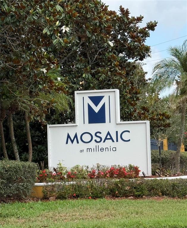 3725 Conroy Road, Unit 2127 Orlando, FL 32839 - Photo 1 of 30 a sign that is sitting in front of a tree