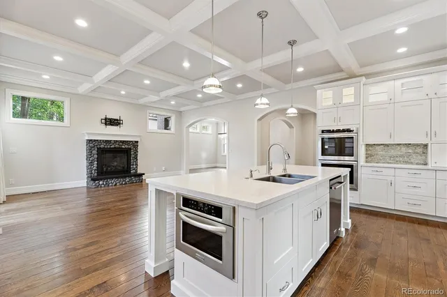 a kitchen with a stove and a microwave oven